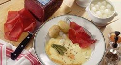 Ser Raclette Seiler -Szwajcaria (1/2 kręgu). Waga 2,6-3 kg.