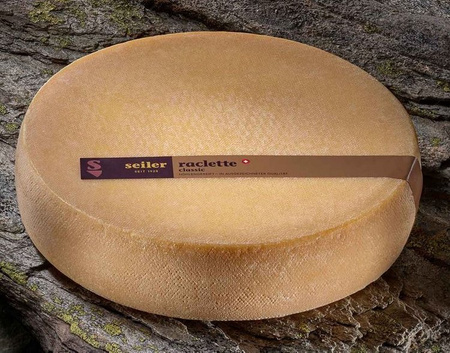 Ser Raclette Seiler -Szwajcaria (1/2 kręgu). Waga 2,6-3 kg.