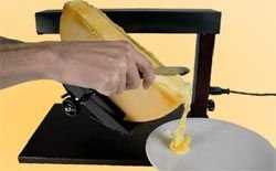 Raclette AMBIANCE firmy TTM - piecyk na 1/2 kręgu sera